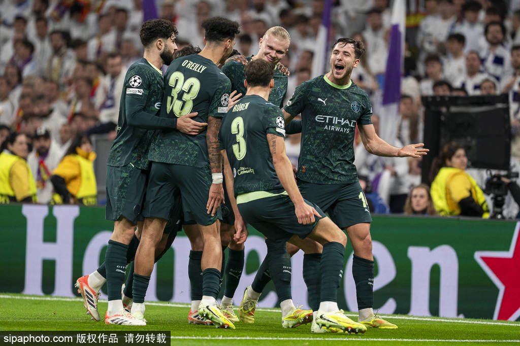 2026世界杯北京时间估计几点_欧冠-罗德里戈破荒哈兰德点射 姆巴佩未登场皇马1-2曼城